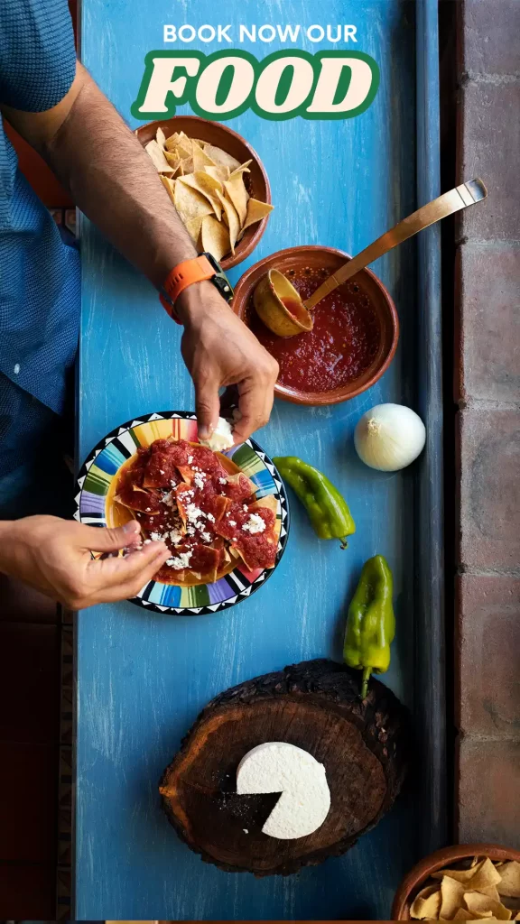 Traditional Oaxacan dishes on blue table during food tour